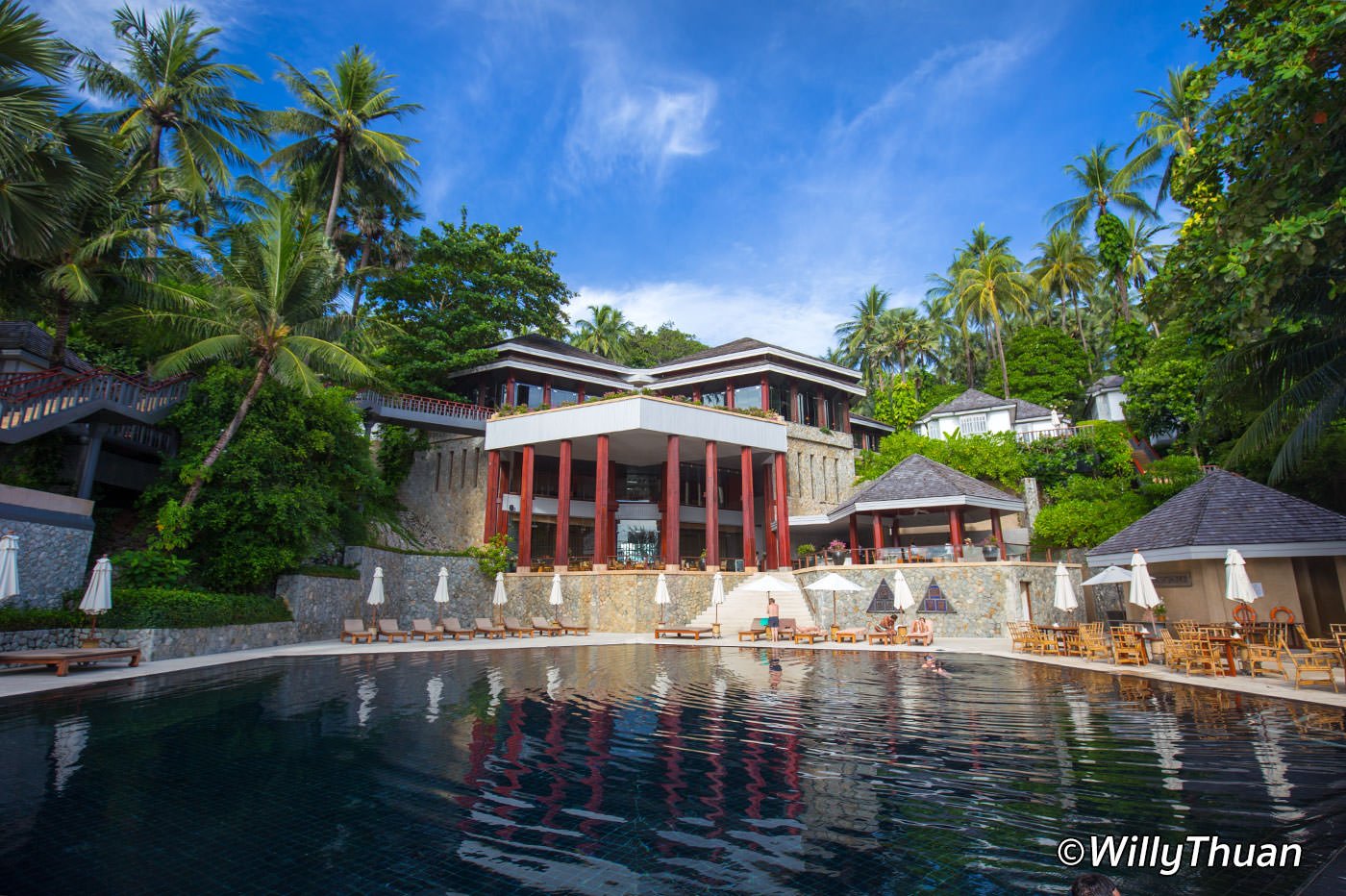 The iconic black pool of The Surin Phuket