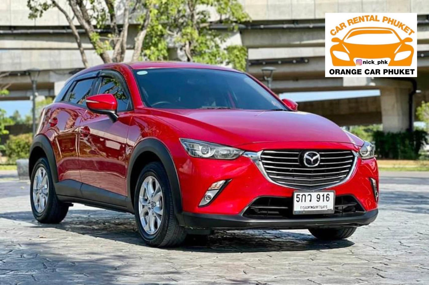 orange car phuket mazda